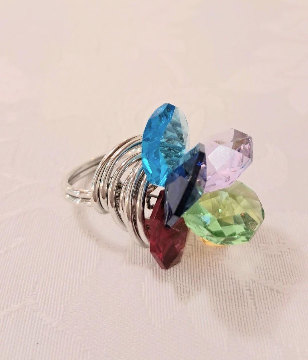 Anello ciuffo multicolor in acciaio