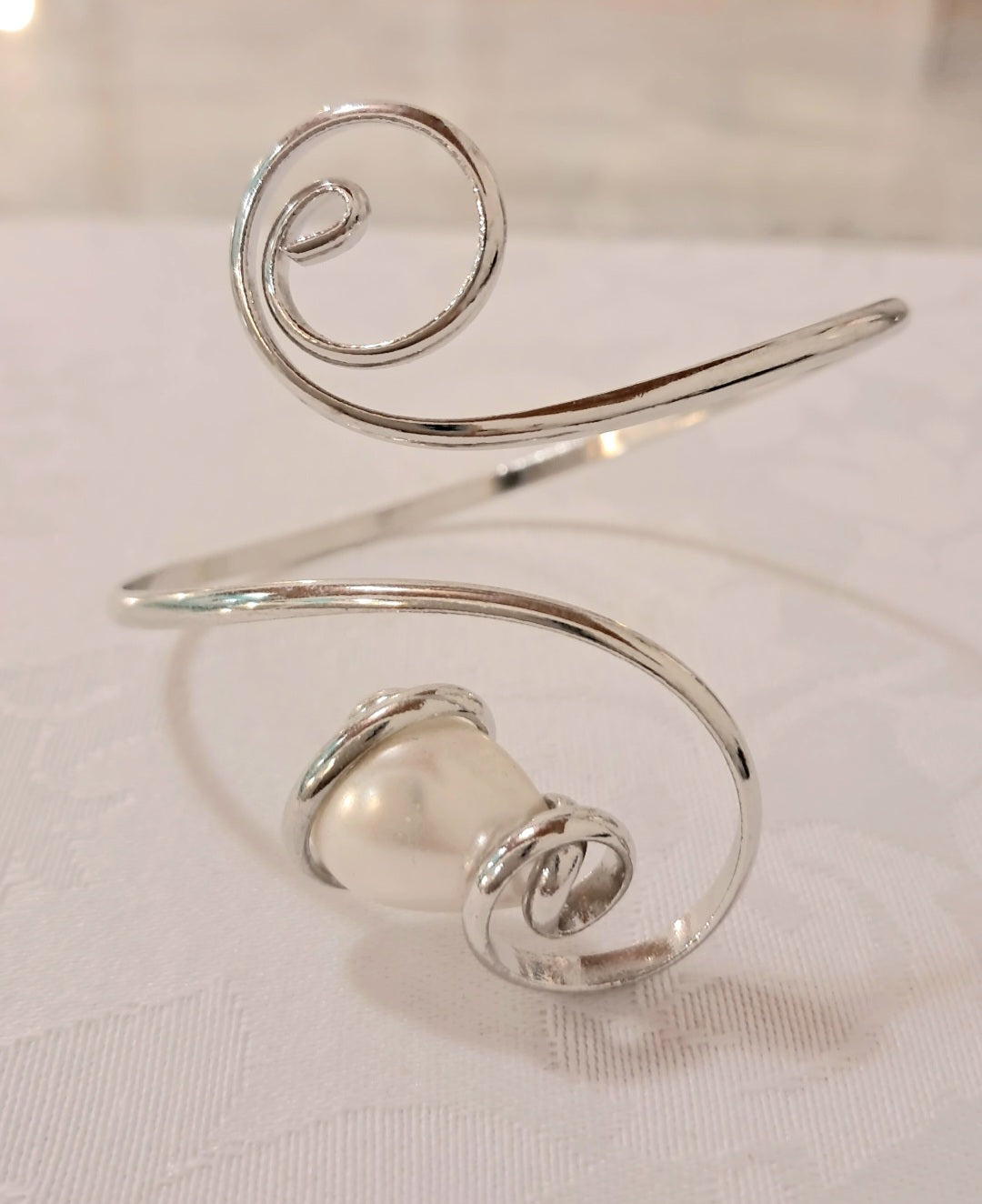 Set in acciaio e perla smaltata