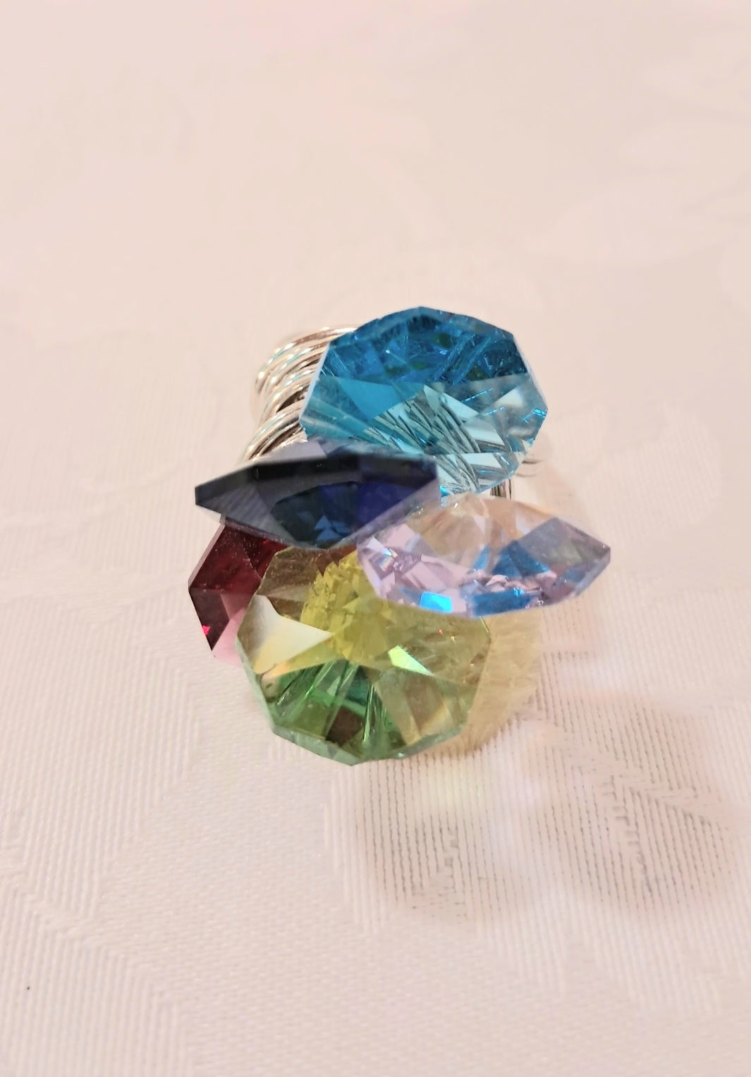 Anello ciuffo multicolor in acciaio